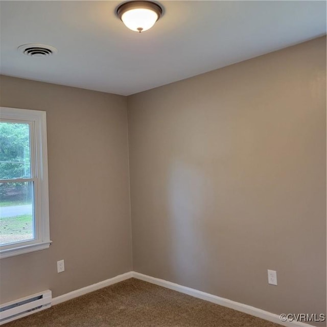 3017 Wright Rd, Petersburg, VA 23805 - spare room featuring baseboard heating and carpet flooring