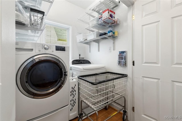 9316 Crossover Dr, Mechanicsville, VA 23116 - washroom featuring separate washer and dryer and wood finished floors