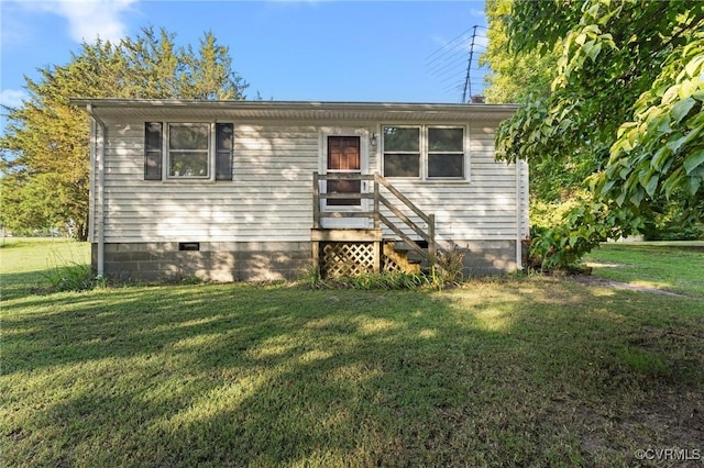 5994 Canterbury Rd, Walkerton, VA 23177 - view of front facade featuring crawl space and a front yard