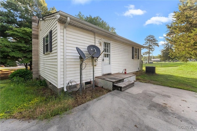5994 Canterbury Rd, Walkerton, VA 23177 - view of side of property with a yard, a chimney, and a patio