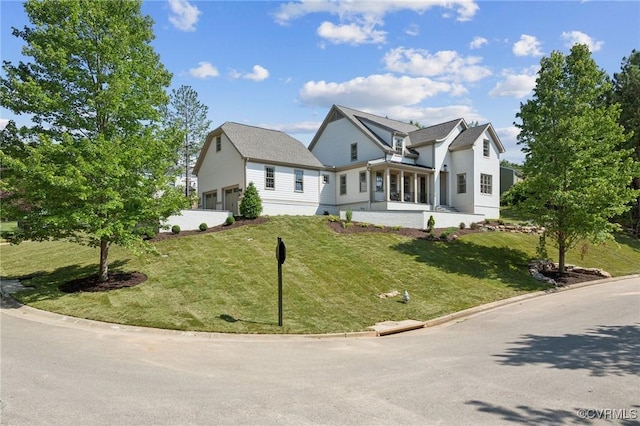 9301 Carriage Stone Ct, Richmond, VA 23235 - view of front facade with an attached garage and a front lawn