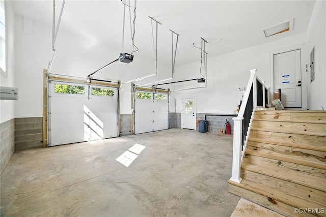 9301 Carriage Stone Ct, Richmond, VA 23235 - garage featuring a garage door opener and electric panel