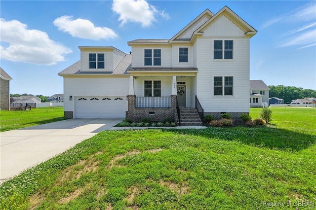 113 Goffigans Trce, Yorktown, VA 23693 - craftsman-style home featuring a porch, concrete driveway, a front lawn, and board and batten siding