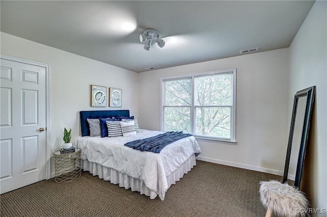 5408 Woolshire Dr, Glen Allen, VA 23059 - bedroom featuring dark carpet and baseboards