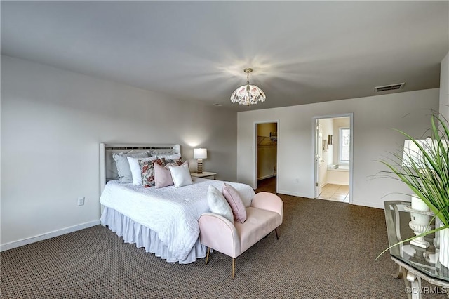 5408 Woolshire Dr, Glen Allen, VA 23059 - carpeted bedroom featuring a chandelier, a spacious closet, connected bathroom, and a closet