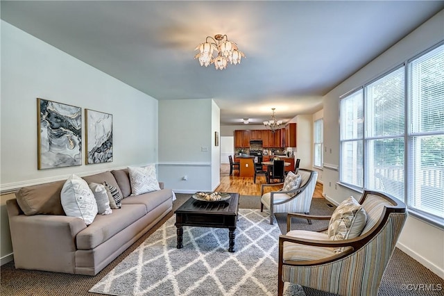 5408 Woolshire Dr, Glen Allen, VA 23059 - living area with a chandelier, healthy amount of natural light, and light carpet