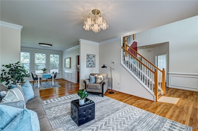 5408 Woolshire Dr, Glen Allen, VA 23059 - living area with a chandelier, ornamental molding, stairs, wood finished floors, and a decorative wall