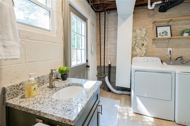 4205 W End Dr, Henrico, VA 23294 - laundry room featuring separate washer and dryer and light wood finished floors