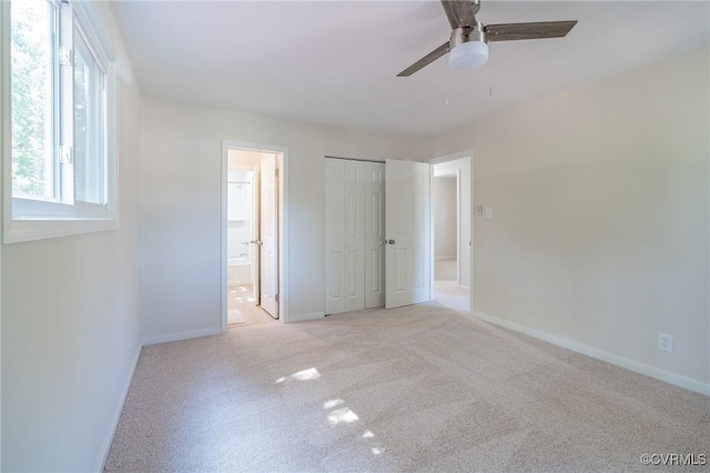 4205 W End Dr, Henrico, VA 23294 - unfurnished bedroom with light colored carpet, ensuite bath, a closet, and a ceiling fan