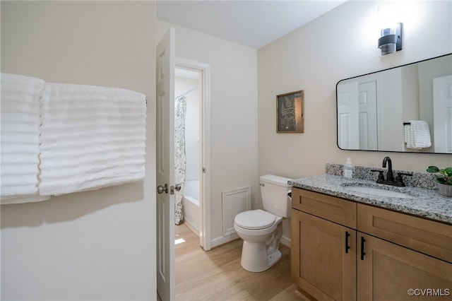 4205 W End Dr, Henrico, VA 23294 - bathroom with vanity, wood finished floors, and tub / shower combination