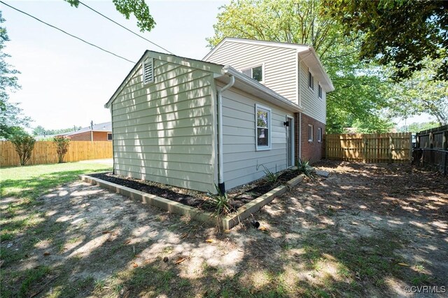 4205 W End Dr, Henrico, VA 23294 - view of side of property featuring a fenced backyard and brick siding