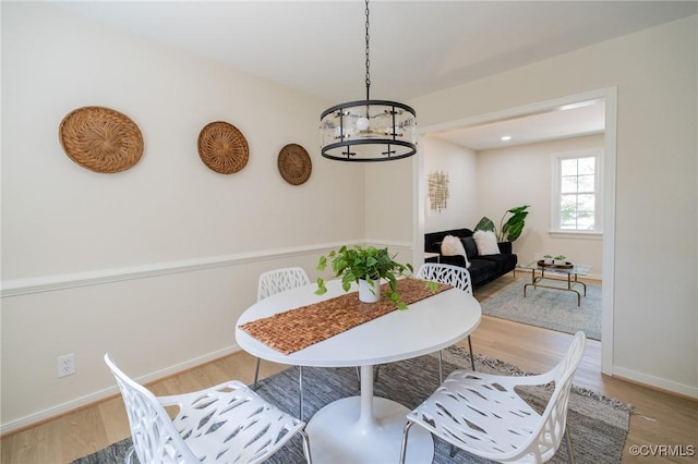 4205 W End Dr, Henrico, VA 23294 - dining area with wood finished floors and a chandelier
