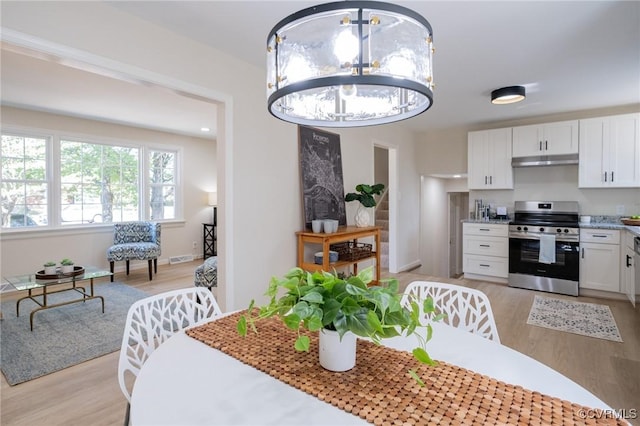 4205 W End Dr, Henrico, VA 23294 - dining area with light wood-style floors and a chandelier