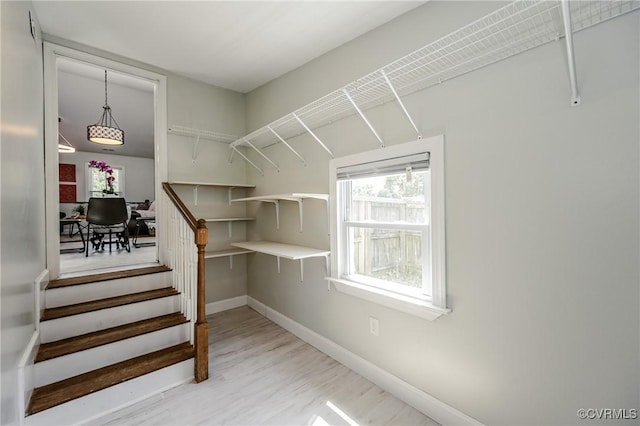 9286 Hungary Rd, Glen Allen, VA 23060 - walk in closet with light wood-style floors
