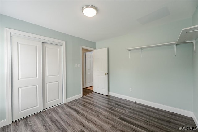9286 Hungary Rd, Glen Allen, VA 23060 - unfurnished bedroom featuring dark wood-type flooring and a closet
