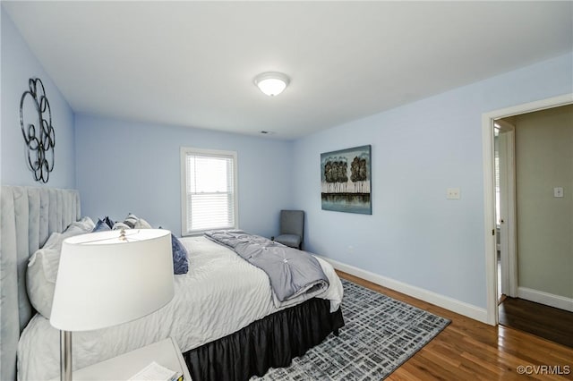 9286 Hungary Rd, Glen Allen, VA 23060 - bedroom featuring baseboards and wood finished floors