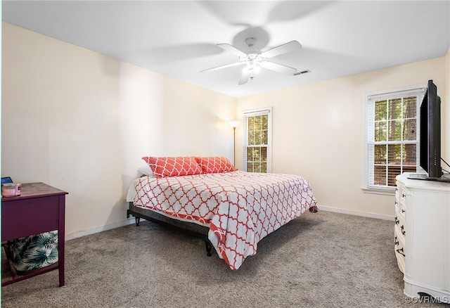 2705 Glen Point Cir, Henrico, VA 23233 - bedroom with multiple windows, light colored carpet, and ceiling fan