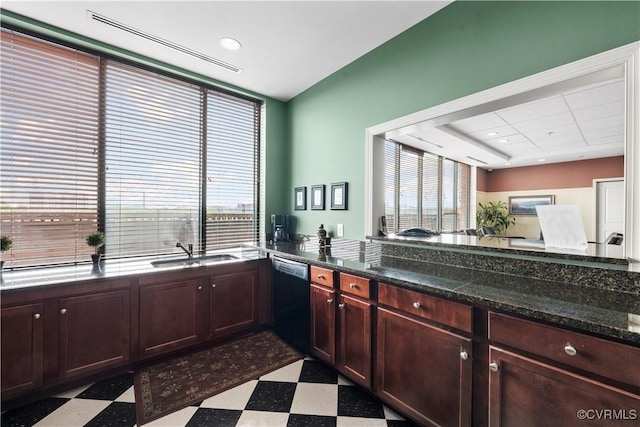 1101 Haxall Pt Unit U712, Richmond, VA 23219 - kitchen featuring black dishwasher, tile patterned floors, and dark stone countertops