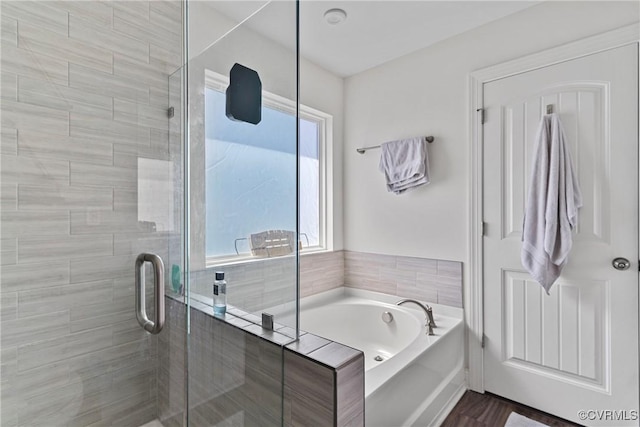 7012 Hapsburg Ct, Henrico, VA 23231 - bathroom with a stall shower, a bath, and wood finished floors