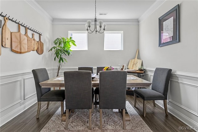 7012 Hapsburg Ct, Henrico, VA 23231 - dining space with a chandelier, dark wood-style floors, a decorative wall, ornamental molding, and a wainscoted wall