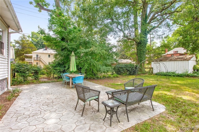 4006 Chevy Chase St, Richmond, VA 23227 - view of patio / terrace featuring a storage unit and outdoor dining area