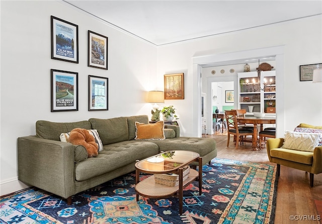 4006 Chevy Chase St, Richmond, VA 23227 - living room with wood finished floors and a chandelier