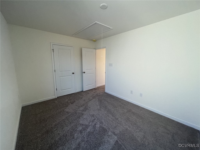4913 Bailey Woods Ln, Midlothian, VA 23112 - spare room featuring attic access and dark colored carpet