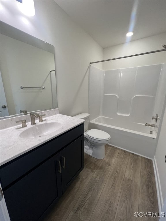 4913 Bailey Woods Ln, Midlothian, VA 23112 - bathroom with wood finished floors, vanity, and shower / bath combination