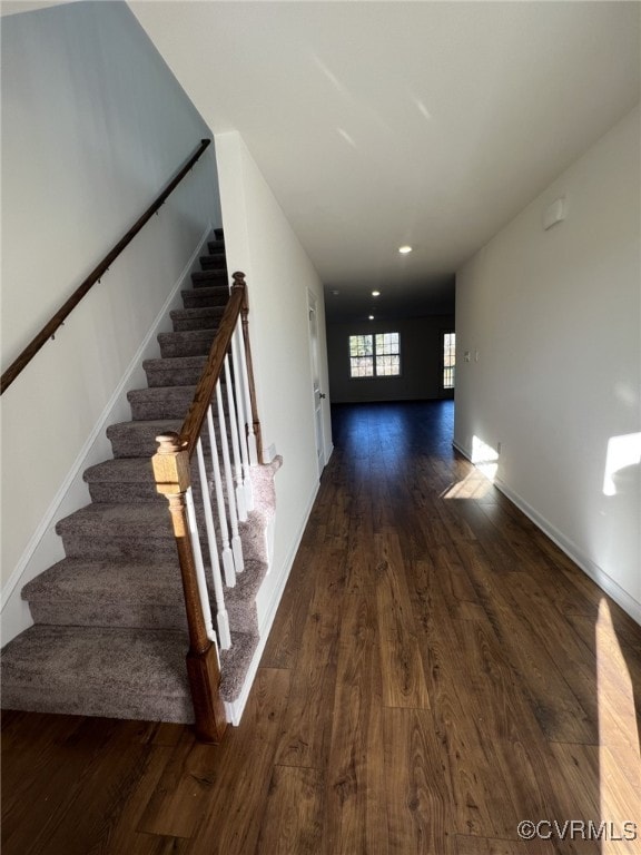 4913 Bailey Woods Ln, Midlothian, VA 23112 - corridor featuring dark wood-type flooring, stairs, and recessed lighting