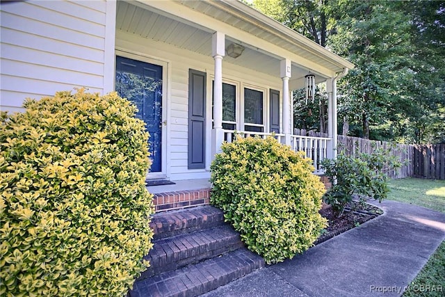 8187 Lord Fairfax Cir, Gloucester, VA 23061 - property entrance featuring a porch