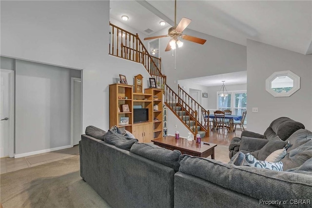 8187 Lord Fairfax Cir, Gloucester, VA 23061 - tiled living area with stairs, high vaulted ceiling, and ceiling fan