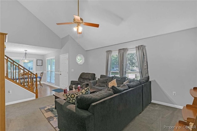 8187 Lord Fairfax Cir, Gloucester, VA 23061 - living area with carpet floors, a ceiling fan, stairs, healthy amount of natural light, and high vaulted ceiling