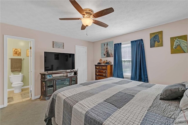 8187 Lord Fairfax Cir, Gloucester, VA 23061 - bedroom with carpet, connected bathroom, and a ceiling fan