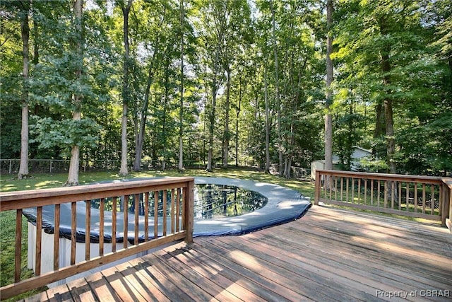 8187 Lord Fairfax Cir, Gloucester, VA 23061 - wooden deck featuring view of scattered trees