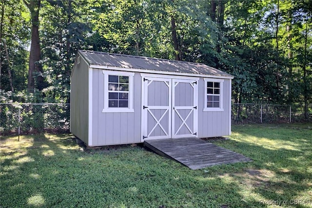 8187 Lord Fairfax Cir, Gloucester, VA 23061 - view of shed with a fenced backyard