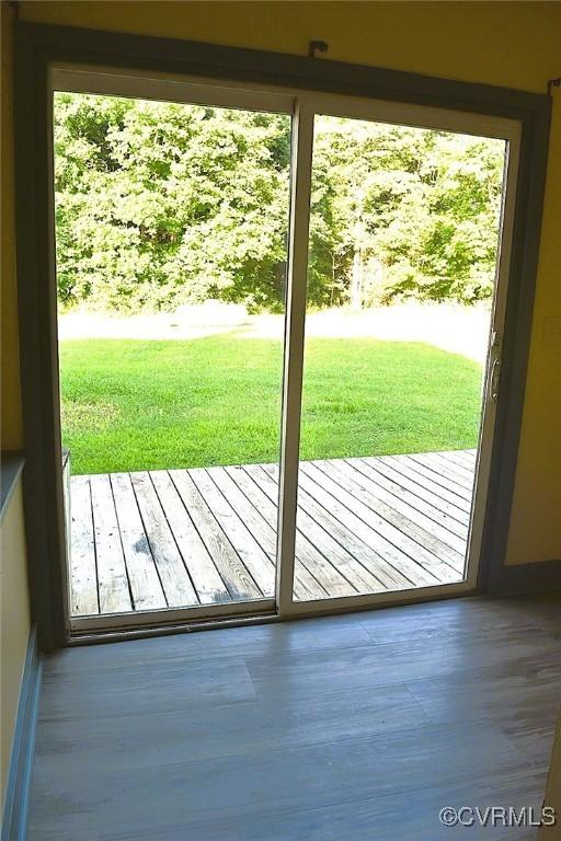 1642 Free State Rd, Meherrin, VA 23954 - doorway to outside featuring healthy amount of natural light and wood finished floors