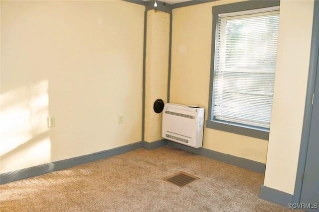 1642 Free State Rd, Meherrin, VA 23954 - carpeted spare room with heating unit and baseboards