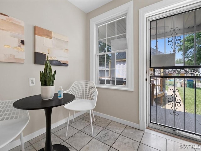 3303 Woodrow Ave, Richmond, VA 23222 - dining area featuring healthy amount of natural light and light tile patterned floors