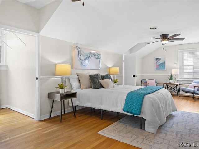 3303 Woodrow Ave, Richmond, VA 23222 - bedroom with wood finished floors, vaulted ceiling, and a ceiling fan