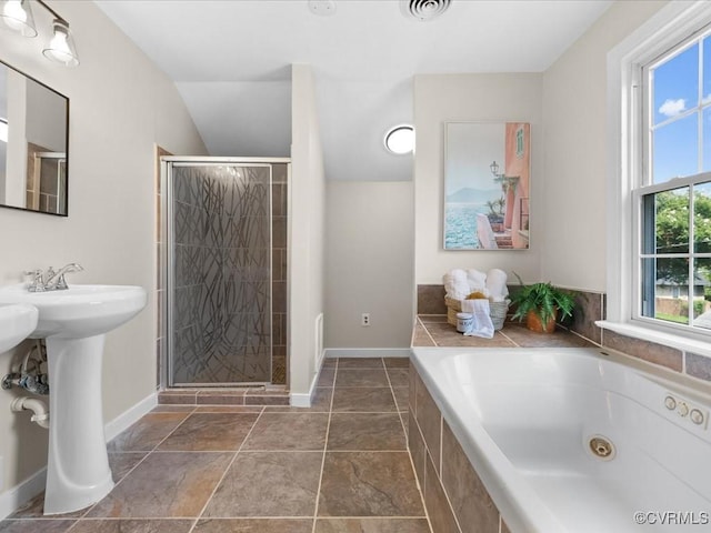 3303 Woodrow Ave, Richmond, VA 23222 - bathroom featuring a tub with jets, a stall shower, and lofted ceiling