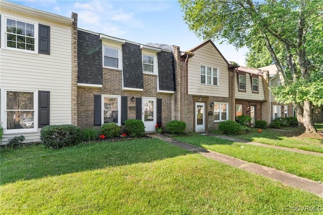 4709 Leadenhall Dr, Chesterfield, VA 23234 - view of property with brick siding, a front lawn, and a shingled roof