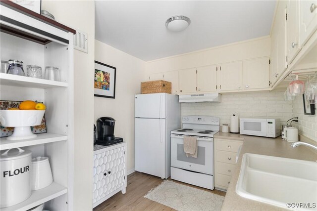 4709 Leadenhall Dr, Chesterfield, VA 23234 - kitchen featuring white appliances, under cabinet range hood, decorative backsplash, light countertops, and light wood finished floors
