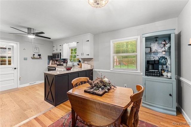 1200 Hybla Rd, Richmond, VA 23236 - dining area with light wood-style flooring and a ceiling fan