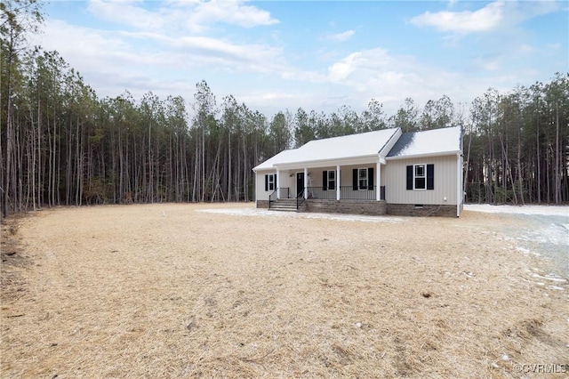 TBD Union Church Rd, Beaverdam, VA 23015 - view of front facade featuring crawl space, covered porch, and a view of trees