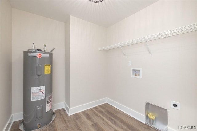 TBD Union Church Rd, Beaverdam, VA 23015 - laundry area featuring electric water heater, electric dryer hookup, hookup for a washing machine, and wood finished floors