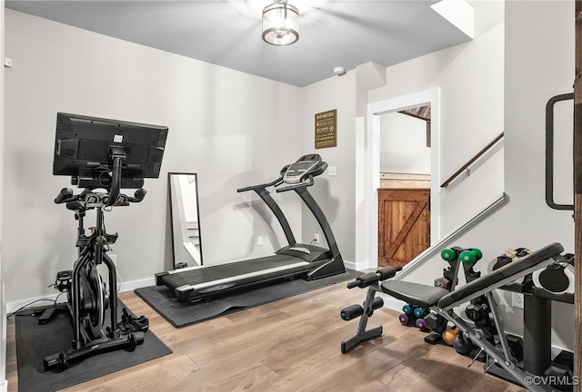 14942 Bridge Spring Dr, Midlothian, VA 23113 - exercise room with wood finished floors and baseboards