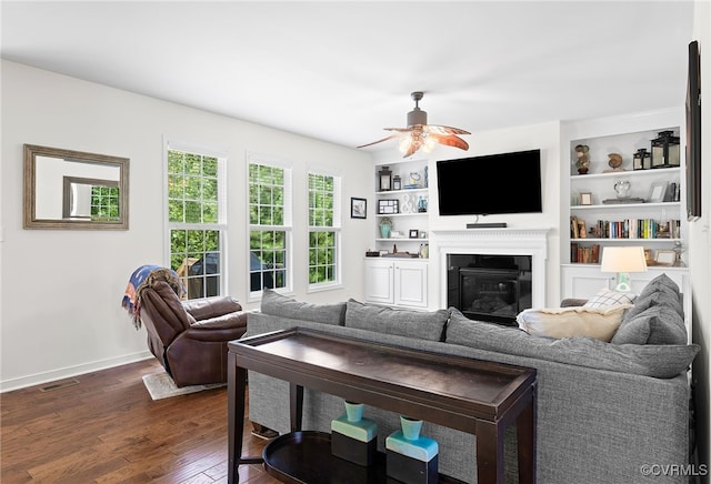 14942 Bridge Spring Dr, Midlothian, VA 23113 - living room with a ceiling fan, dark wood-type flooring, and a glass covered fireplace