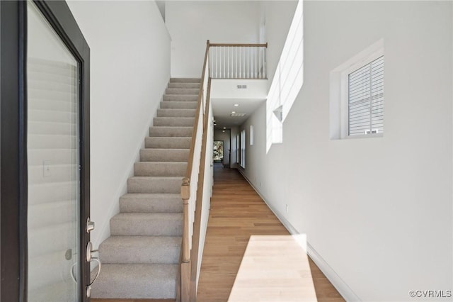 124 Steyland St, Ashland, VA 23005 - stairway featuring wood finished floors and a high ceiling