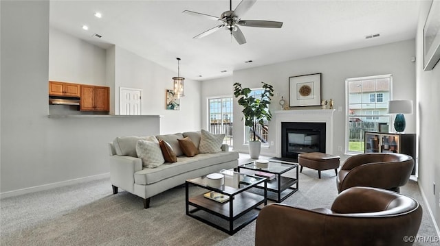3208 Warm Springs Way, Henrico, VA 23223 - carpeted living area featuring a ceiling fan, a glass covered fireplace, recessed lighting, and lofted ceiling