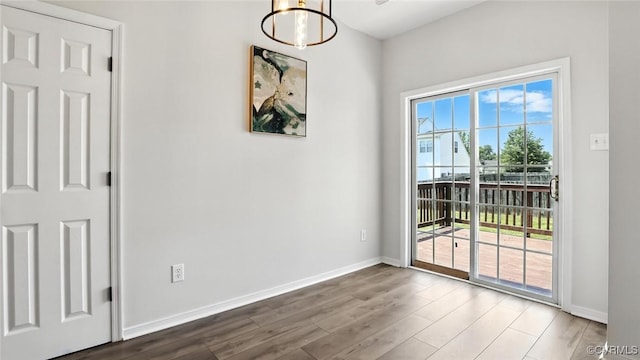 3208 Warm Springs Way, Henrico, VA 23223 - unfurnished dining area with wood finished floors and a chandelier